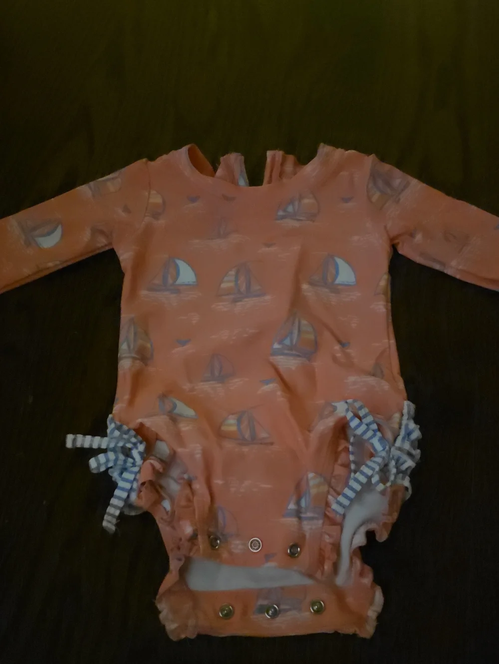 Ruffle Butts Coral Long-Sleeve One-Piece Swimsuit with Sailboat Print
